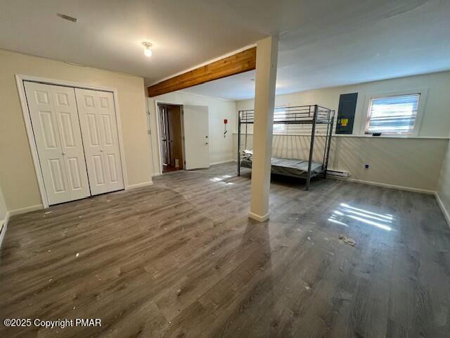 127 Louise Lane Bartonsville, PA 18321 - Photo 18 of 19 an empty room with wooden floor cabinet and windows