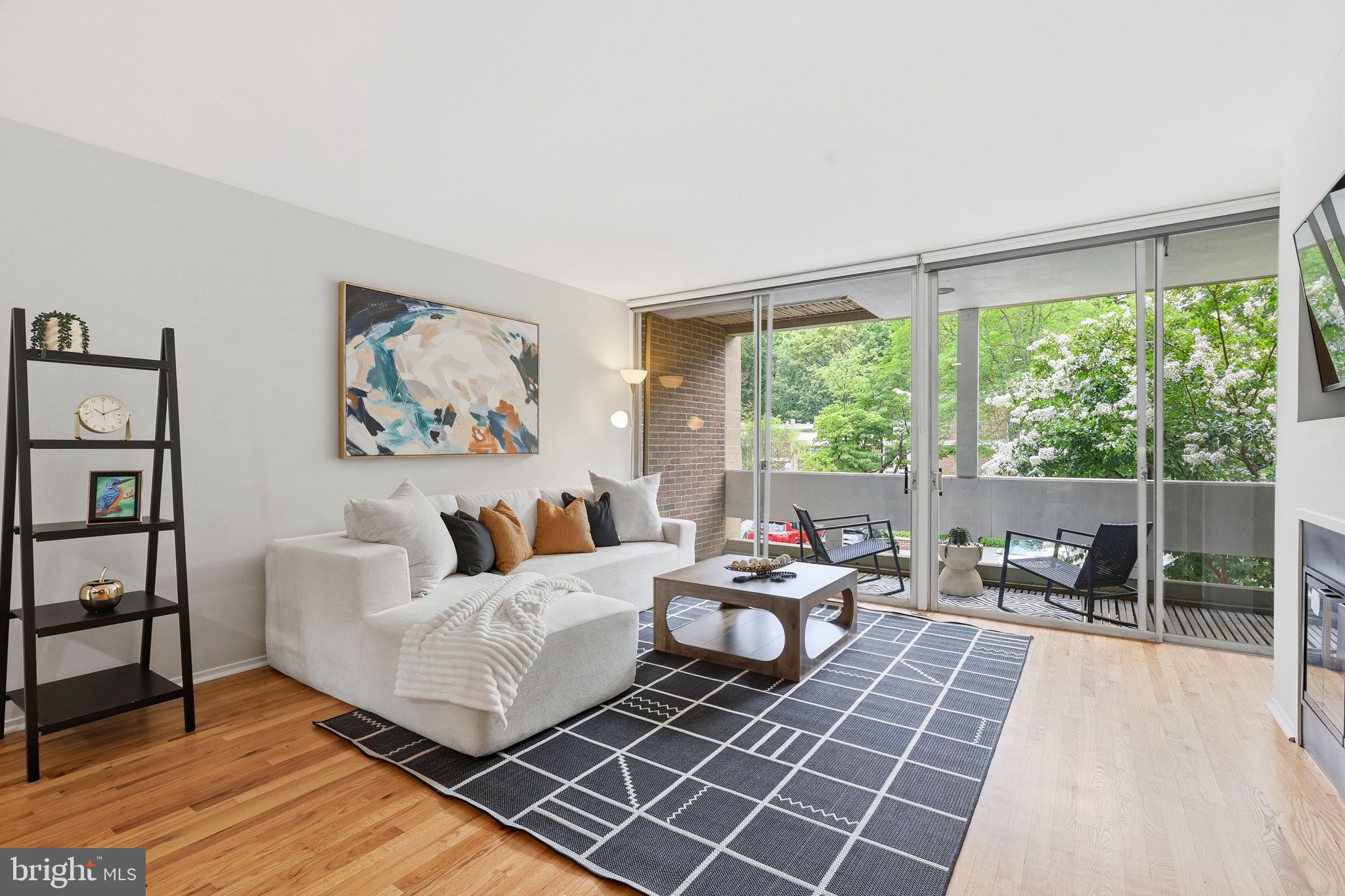 11510 Maple Ridge Road Reston, VA 20190 - Photo 9 of 43 a living room with furniture and a large window