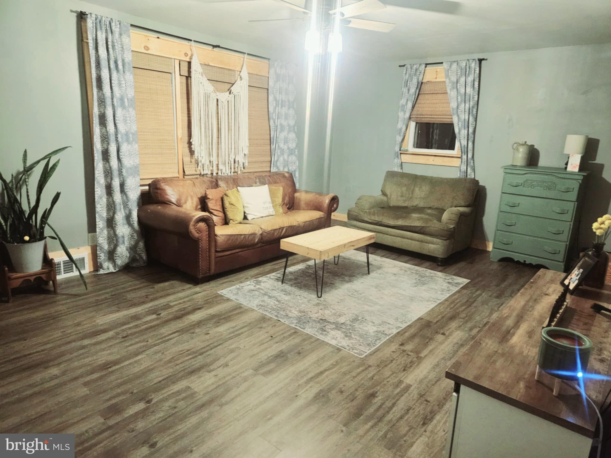 27 Barretts Run Road Bridgeton, NJ 08302 - Photo 9 of 21 a living room with furniture and a large window