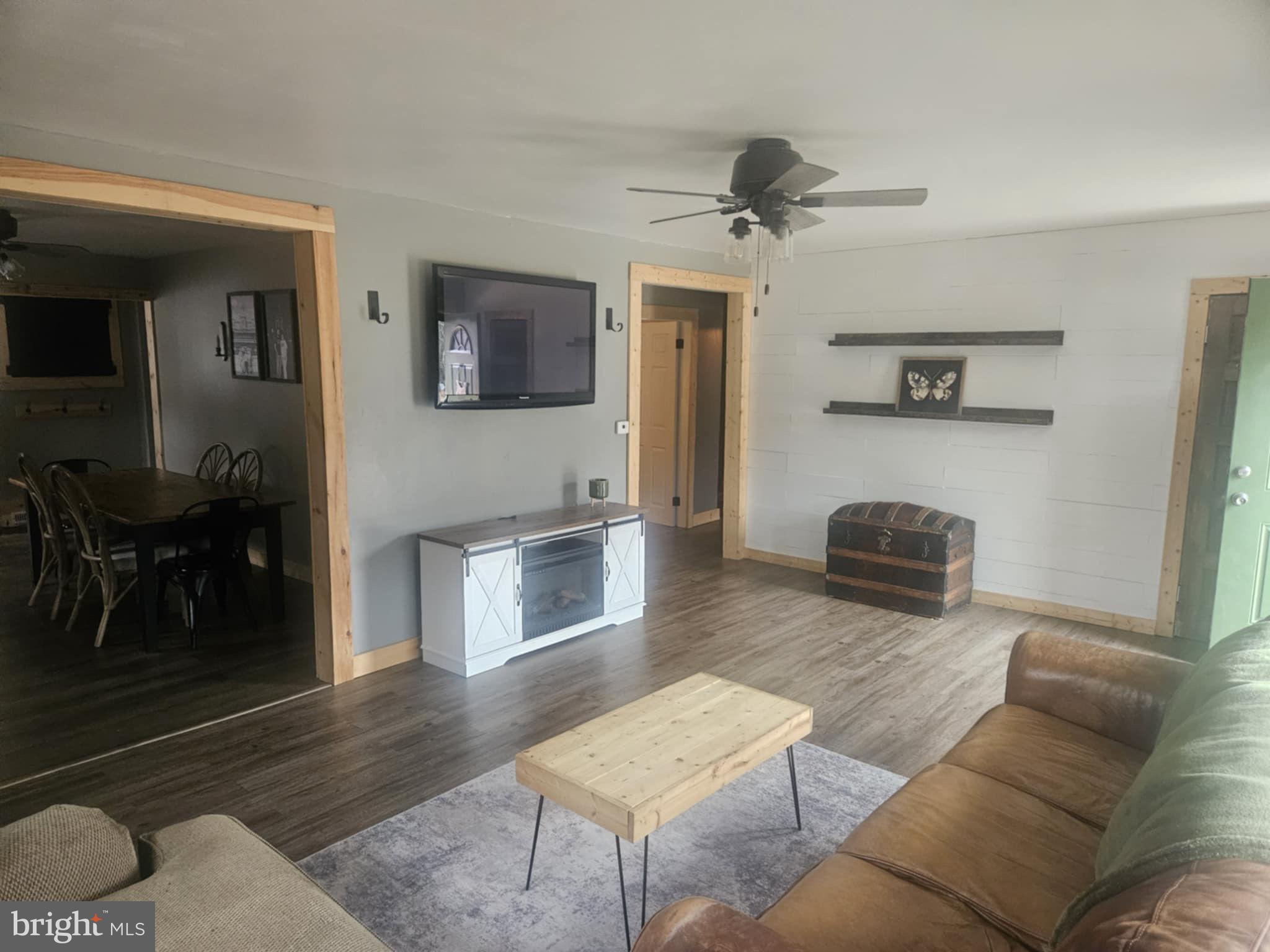 27 Barretts Run Road Bridgeton, NJ 08302 - Photo 10 of 21 a living room with furniture and a wooden floor