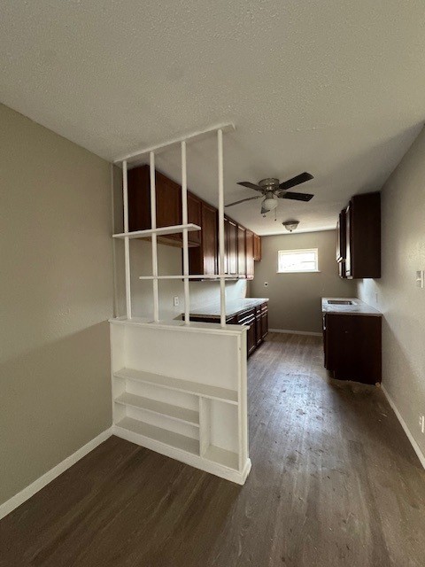 4706 Yellowstone Boulevard, Unit 12 Houston, TX 77021 - Photo 4 of 23 a view of a living room with wooden floor and windows