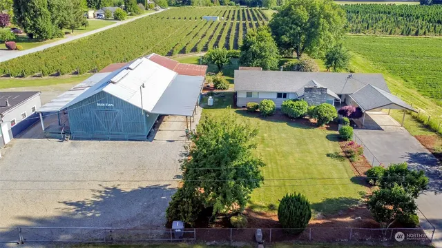 an aerial view of a house with a garden