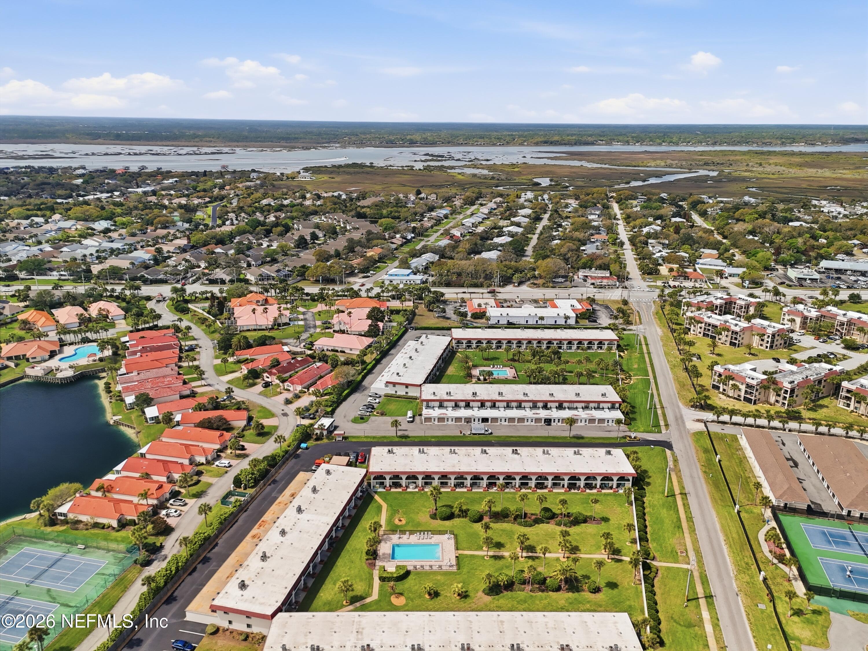 11 Dondanville Road, Unit 28 St. Augustine, FL 32080 - Photo 36 of 37 an aerial view of residential houses with outdoor space