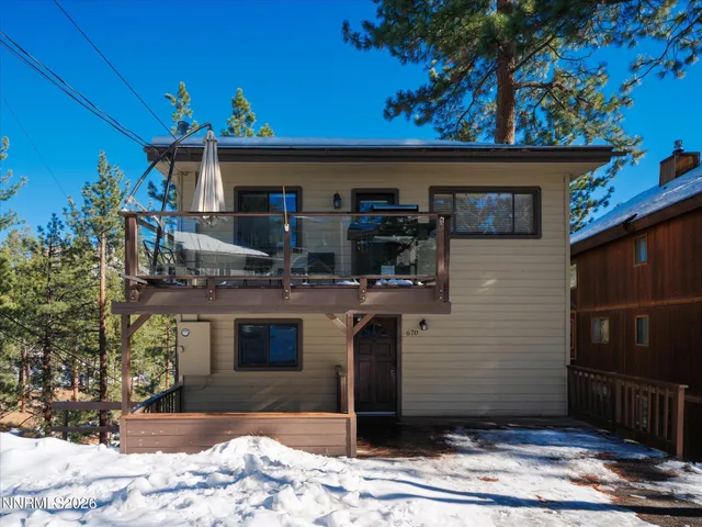 a view of a entryway door of house