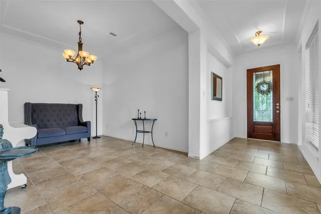 a view of livingroom with furniture and windows
