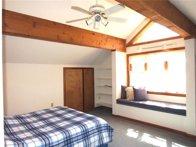 354 Lake Road Somerset, PA 15502 - Photo 14 of 25 Master Bedroom As you can see this room catches the afternoon sun! Curl up on the window seat and enjoy! Additional storage space is provided on both sides of the room. There is a walk in closet too!
