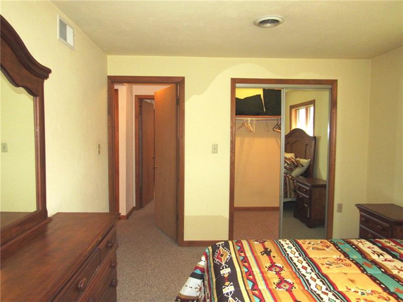 354 Lake Road Somerset, PA 15502 - Photo 23 of 25 Did you notice that this is the third bedroom that has a private bathroom?? Behind the mirrored sliding door is another walk in closet (the third if you are counting).