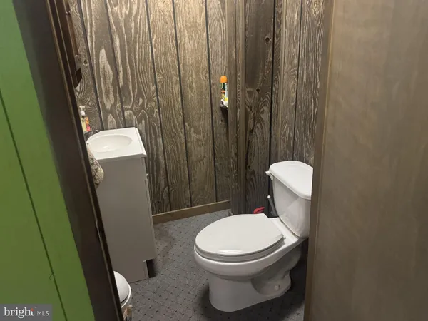 a view of a balcony with chairs