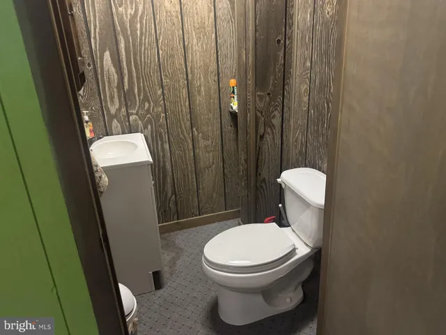 a view of a balcony with chairs