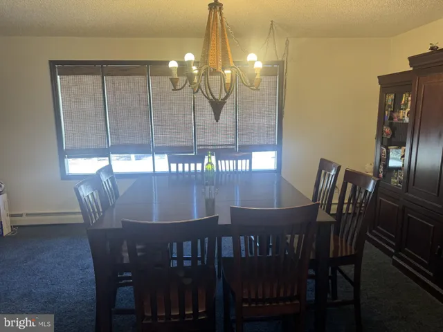 a view of a dining room with furniture