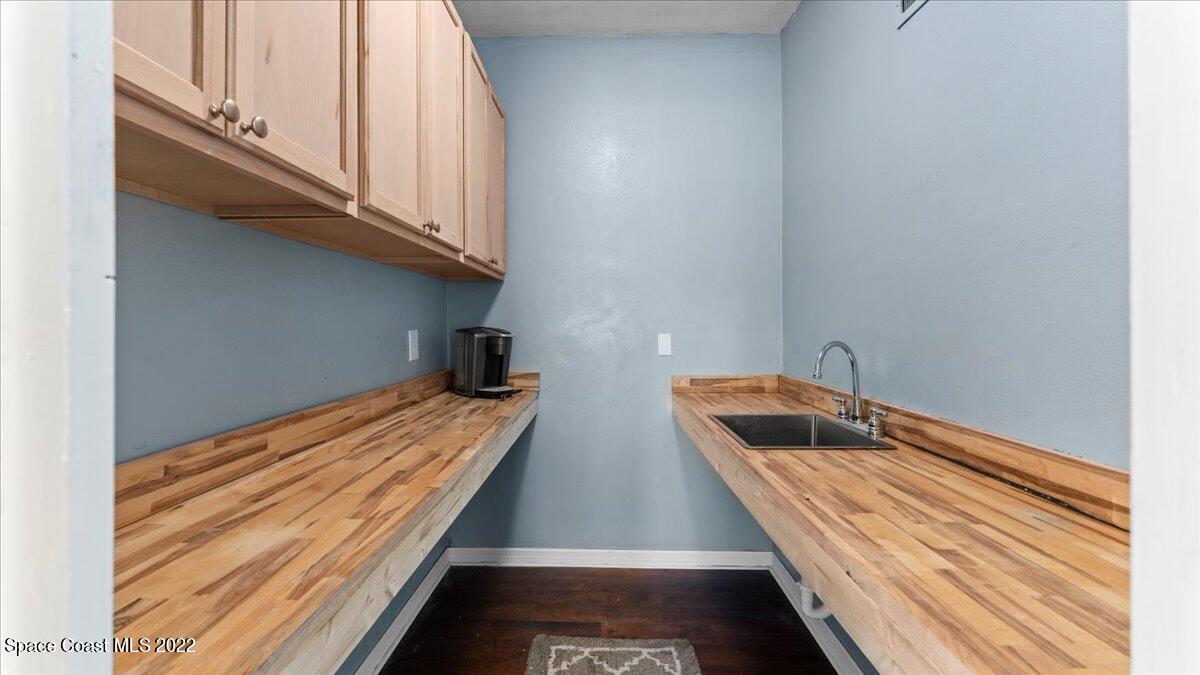 912 Bali Road Cocoa Beach, FL 32931 - Photo 32 of 48 a view of a room with two washing machine