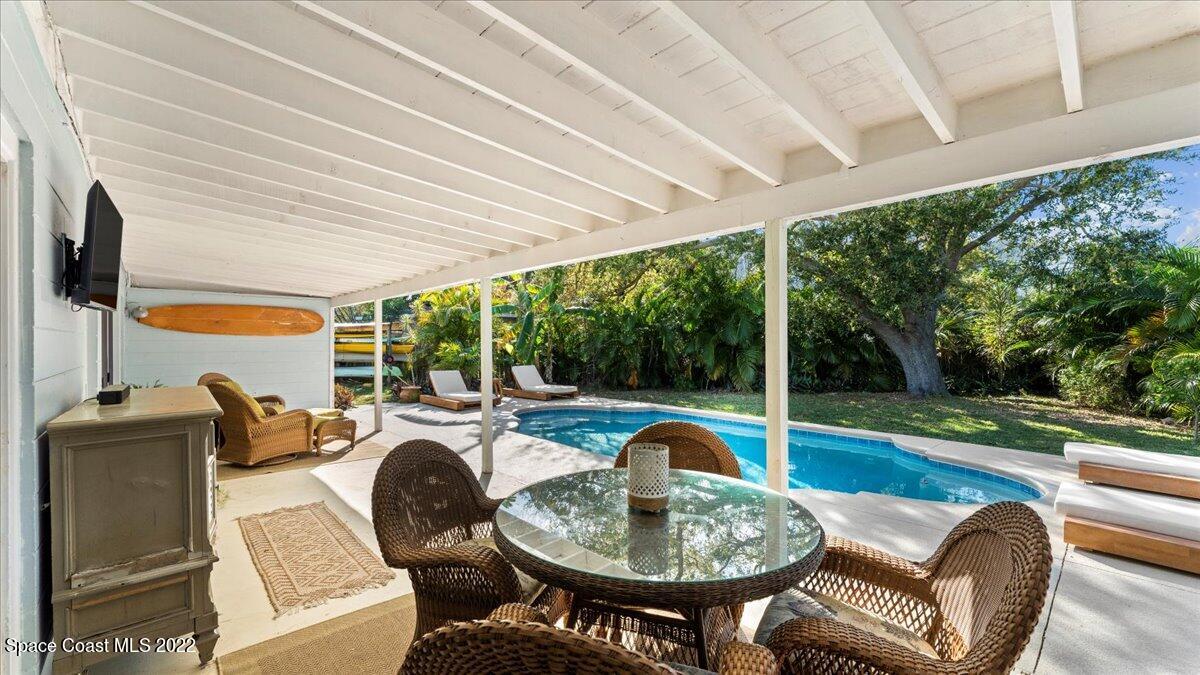 912 Bali Road Cocoa Beach, FL 32931 - Photo 34 of 48 a outdoor space with furniture