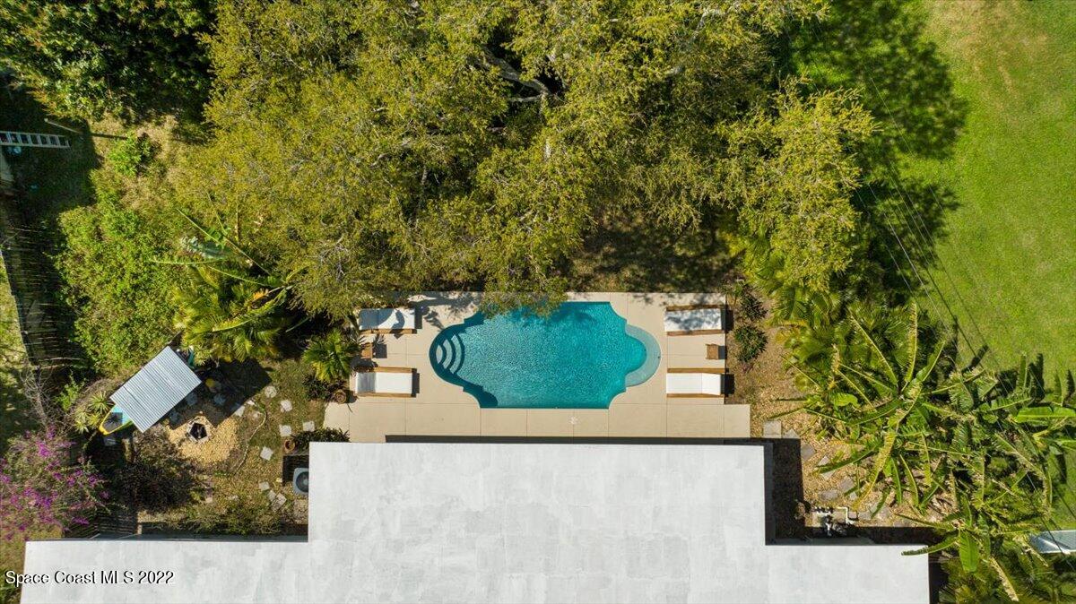 912 Bali Road Cocoa Beach, FL 32931 - Photo 42 of 48 a view of outdoor space and yard