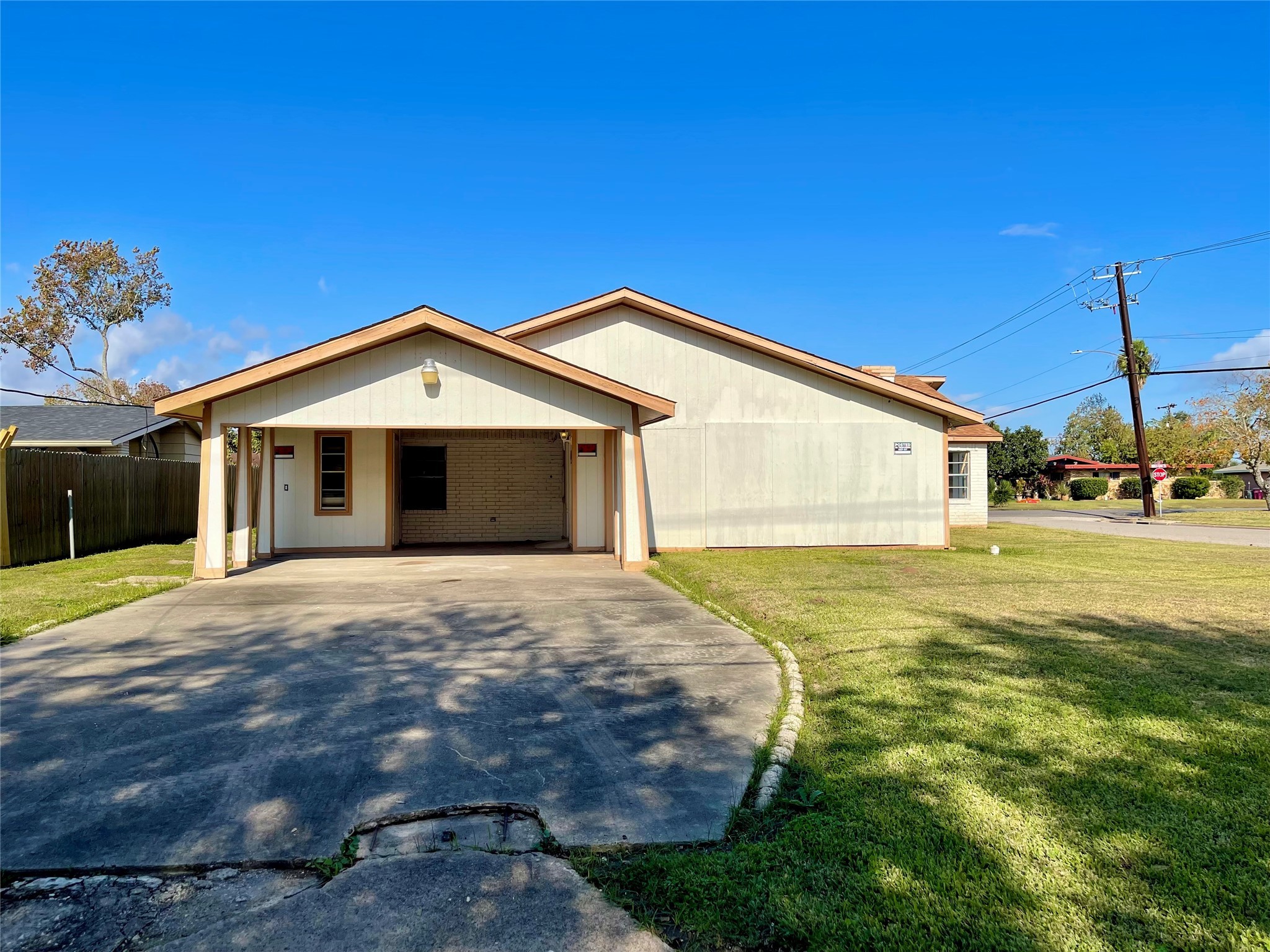 903 West 8th Street Freeport, TX 77541 - Photo 20 of 20 a front view of a house with a yard