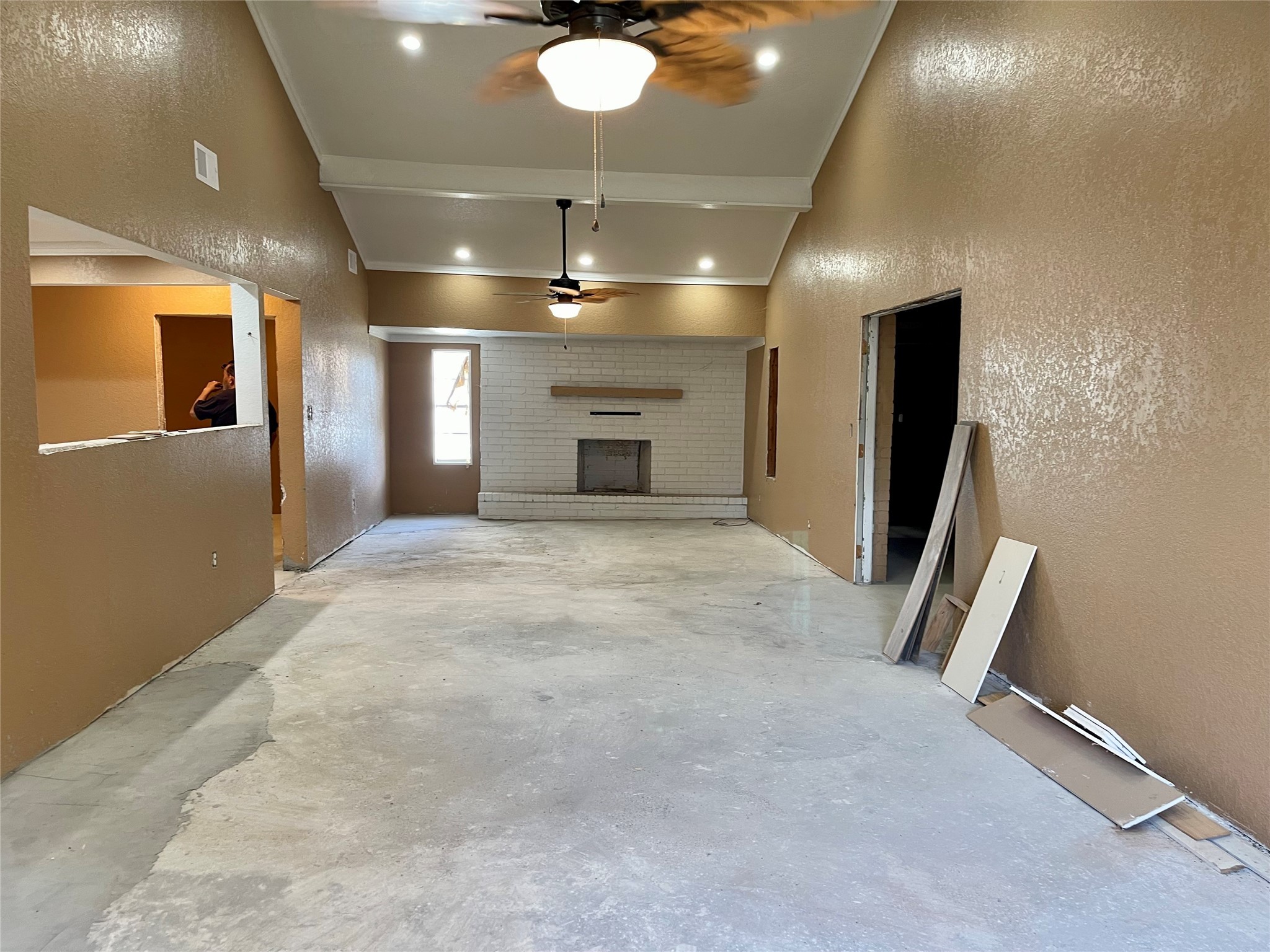 903 West 8th Street Freeport, TX 77541 - Photo 4 of 20 an empty room with wooden floor and chandelier
