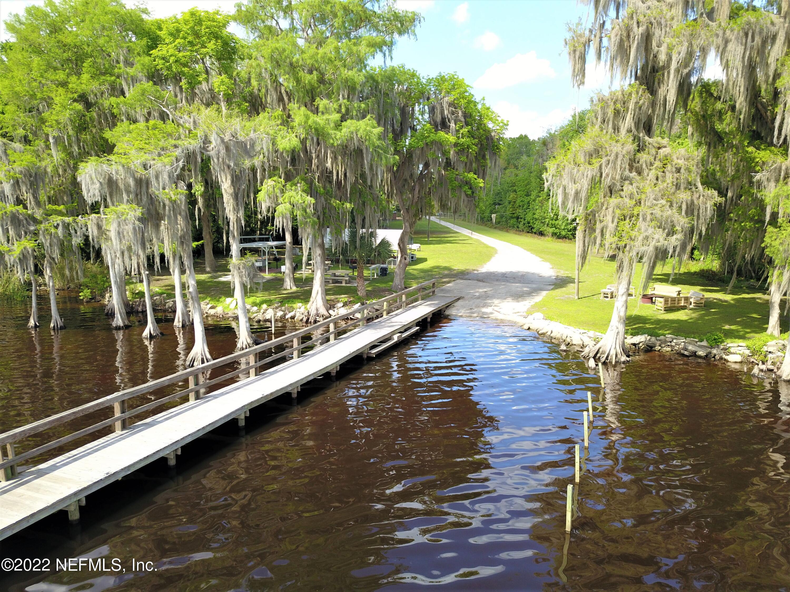 113 3rd Street Georgetown, FL 32139 - Photo 3 of 13 a view of an outdoor space and swimming pool
