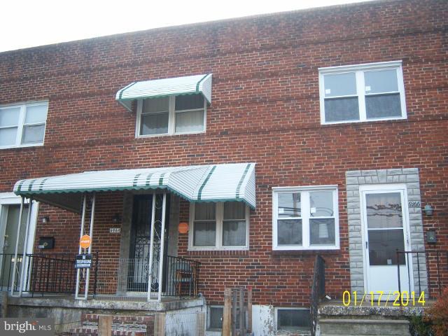 6966 Reisterstown Road Baltimore, MD 21215 - Photo 2 of 17 front view of a brick building