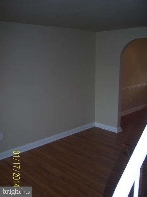 6966 Reisterstown Road Baltimore, MD 21215 - Photo 11 of 17 a view of a small space with wooden floor