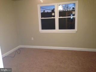 6966 Reisterstown Road Baltimore, MD 21215 - Photo 7 of 17 a view of wooden wall