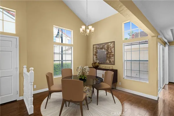 a kitchen with cabinets appliances and a counter top space