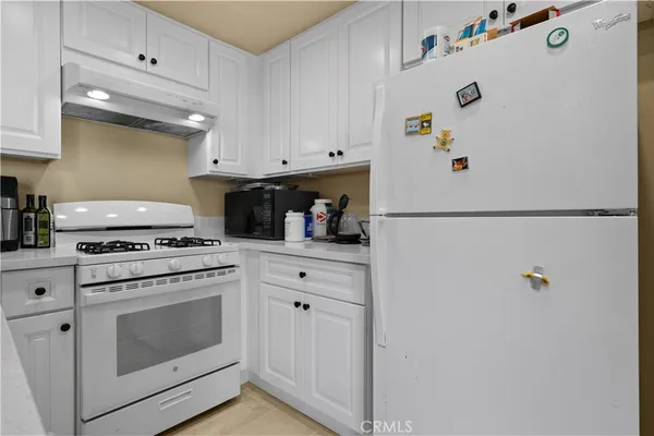 a bedroom with bed and window