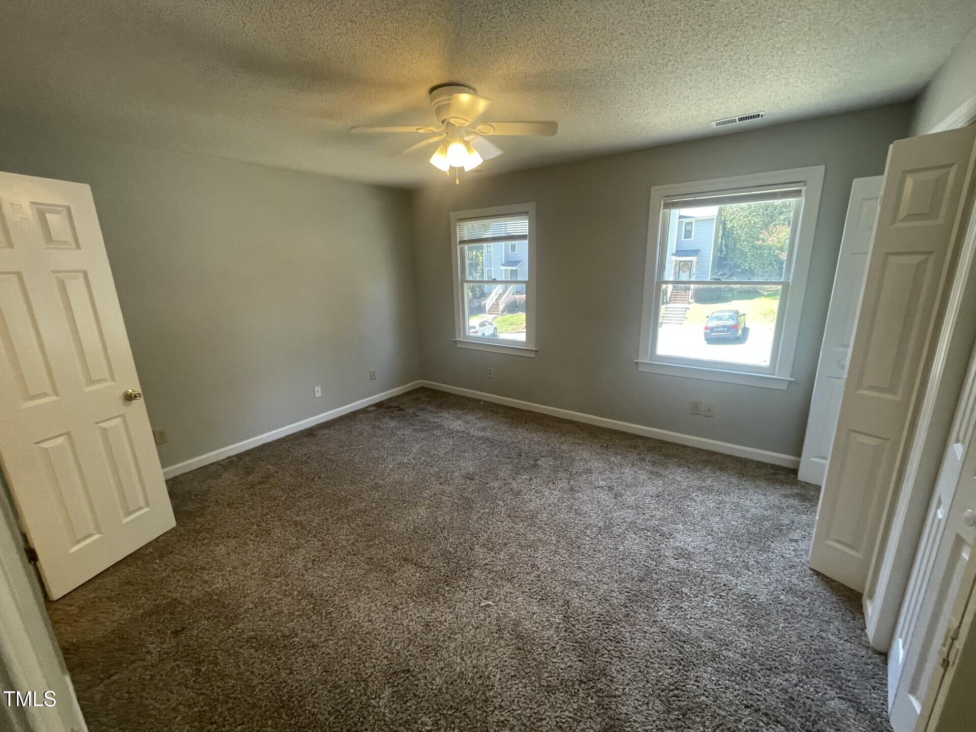 6140 Loch Laural Lane Raleigh, NC 27613 - Photo 15 of 21 a view of an empty room with a window