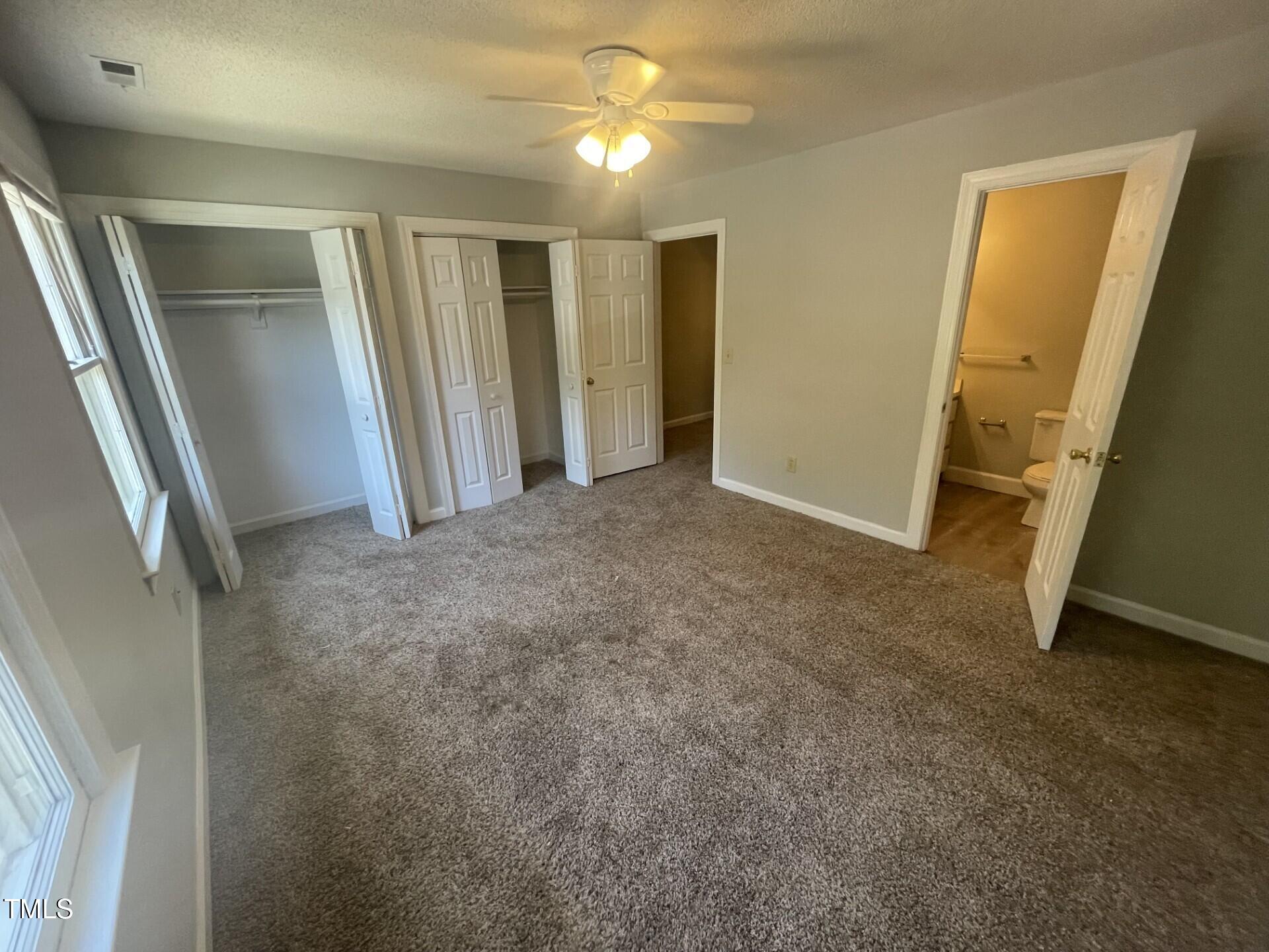 6140 Loch Laural Lane Raleigh, NC 27613 - Photo 16 of 21 a view of empty room with wooden floor