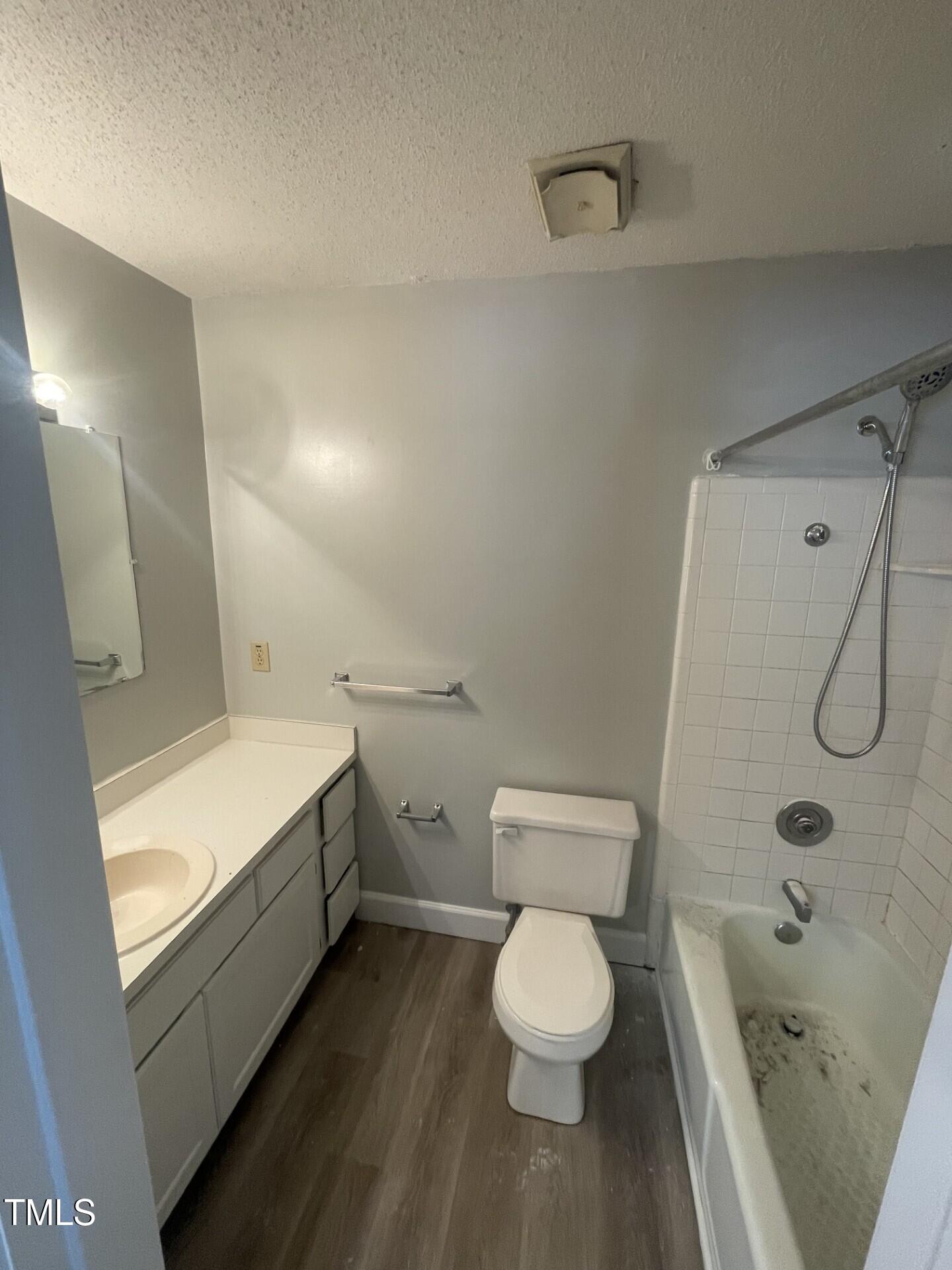6140 Loch Laural Lane Raleigh, NC 27613 - Photo 17 of 21 a bathroom with a sink toilet and shower