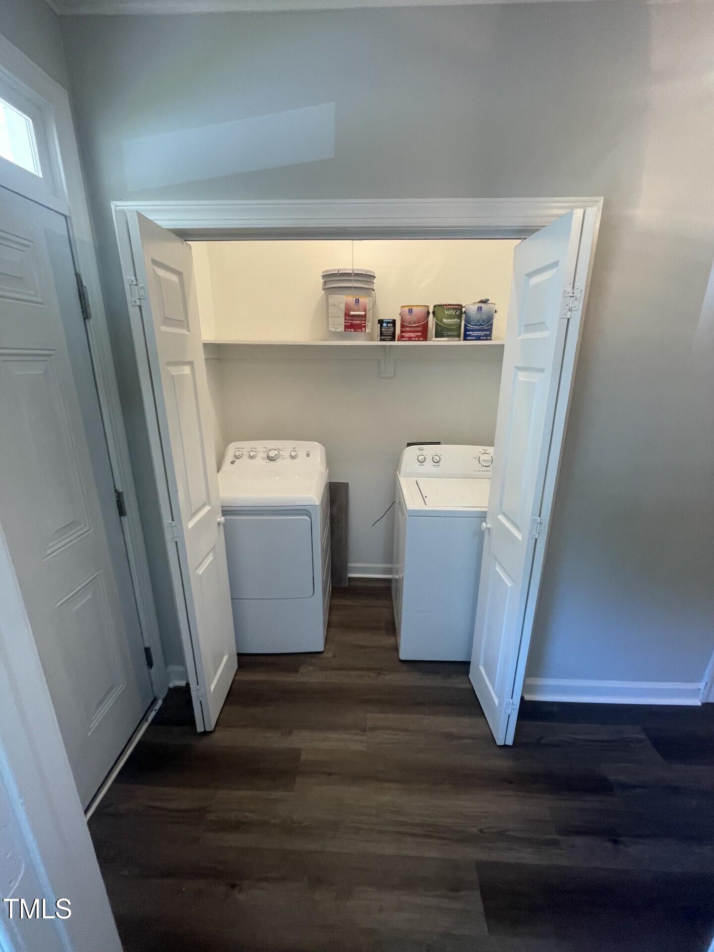 6140 Loch Laural Lane Raleigh, NC 27613 - Photo 21 of 21 a room with wooden floor and storage