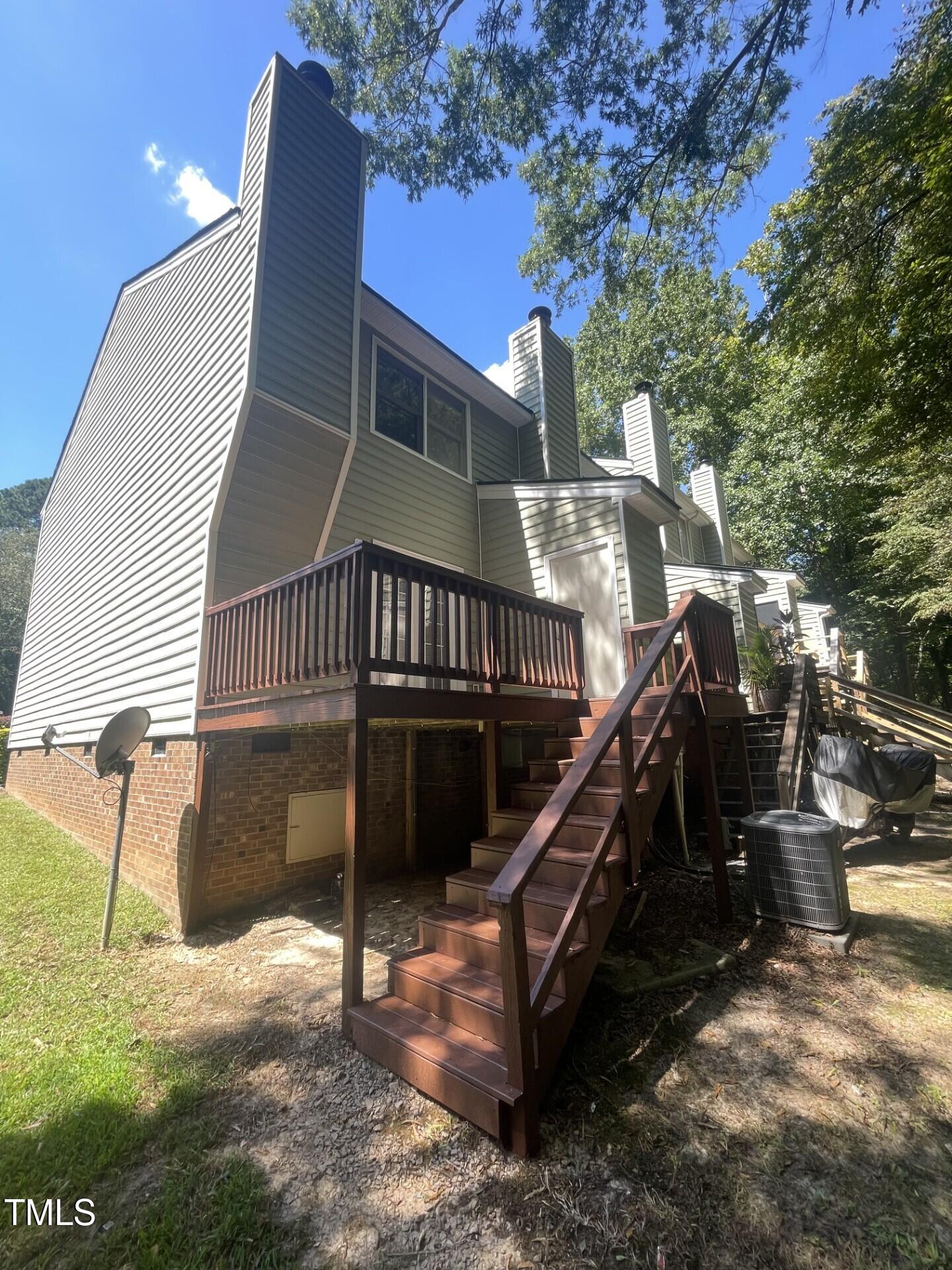6140 Loch Laural Lane Raleigh, NC 27613 - Photo 4 of 21 a view of a house with a yard