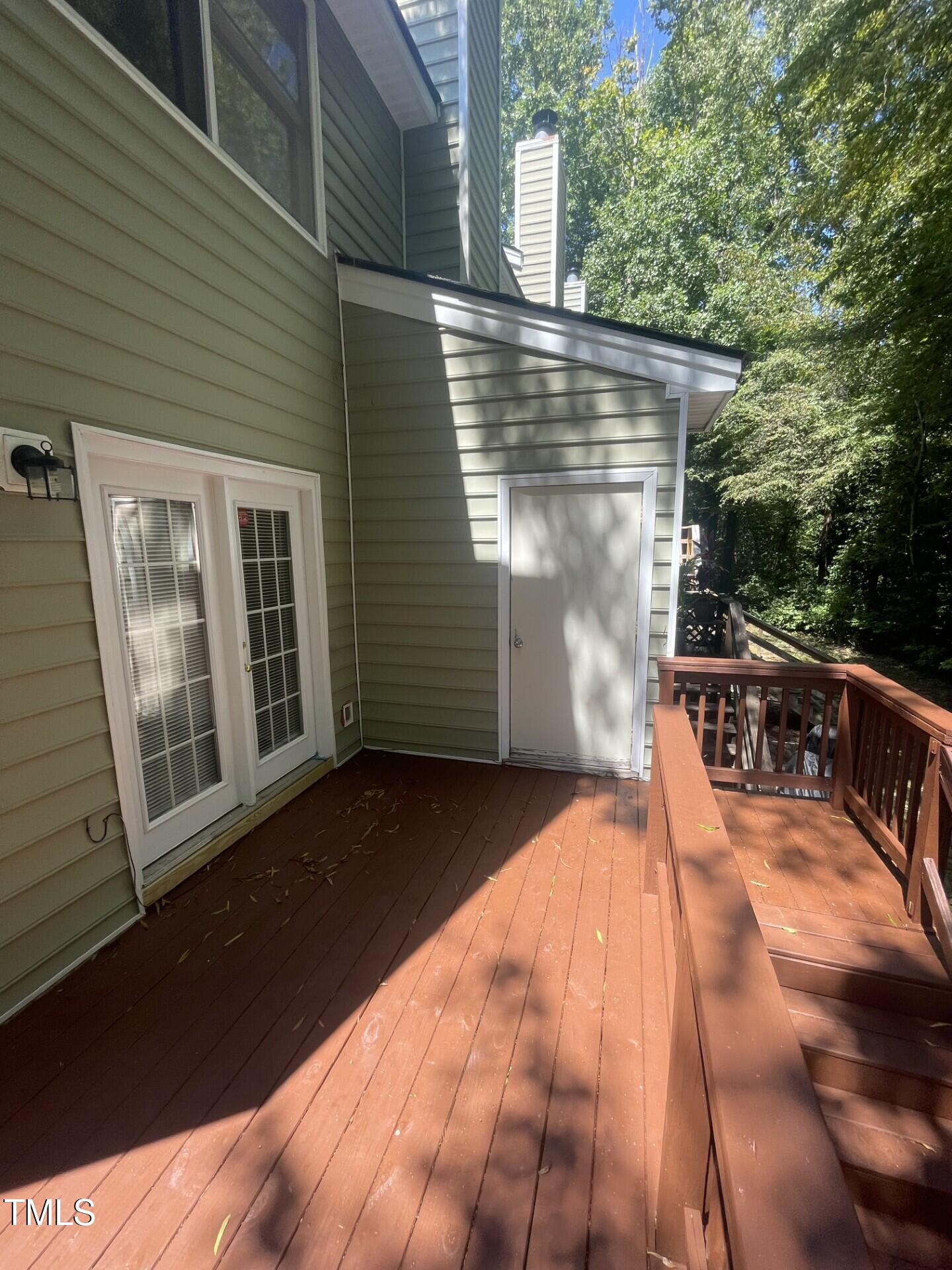 6140 Loch Laural Lane Raleigh, NC 27613 - Photo 6 of 21 a view of a house with backyard and porch