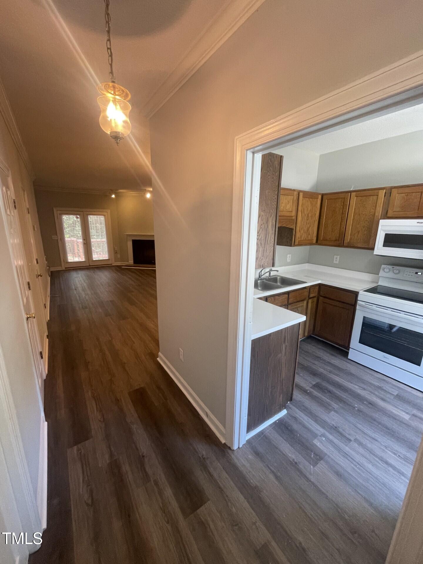 6140 Loch Laural Lane Raleigh, NC 27613 - Photo 7 of 21 a living room with furniture and a wooden floor