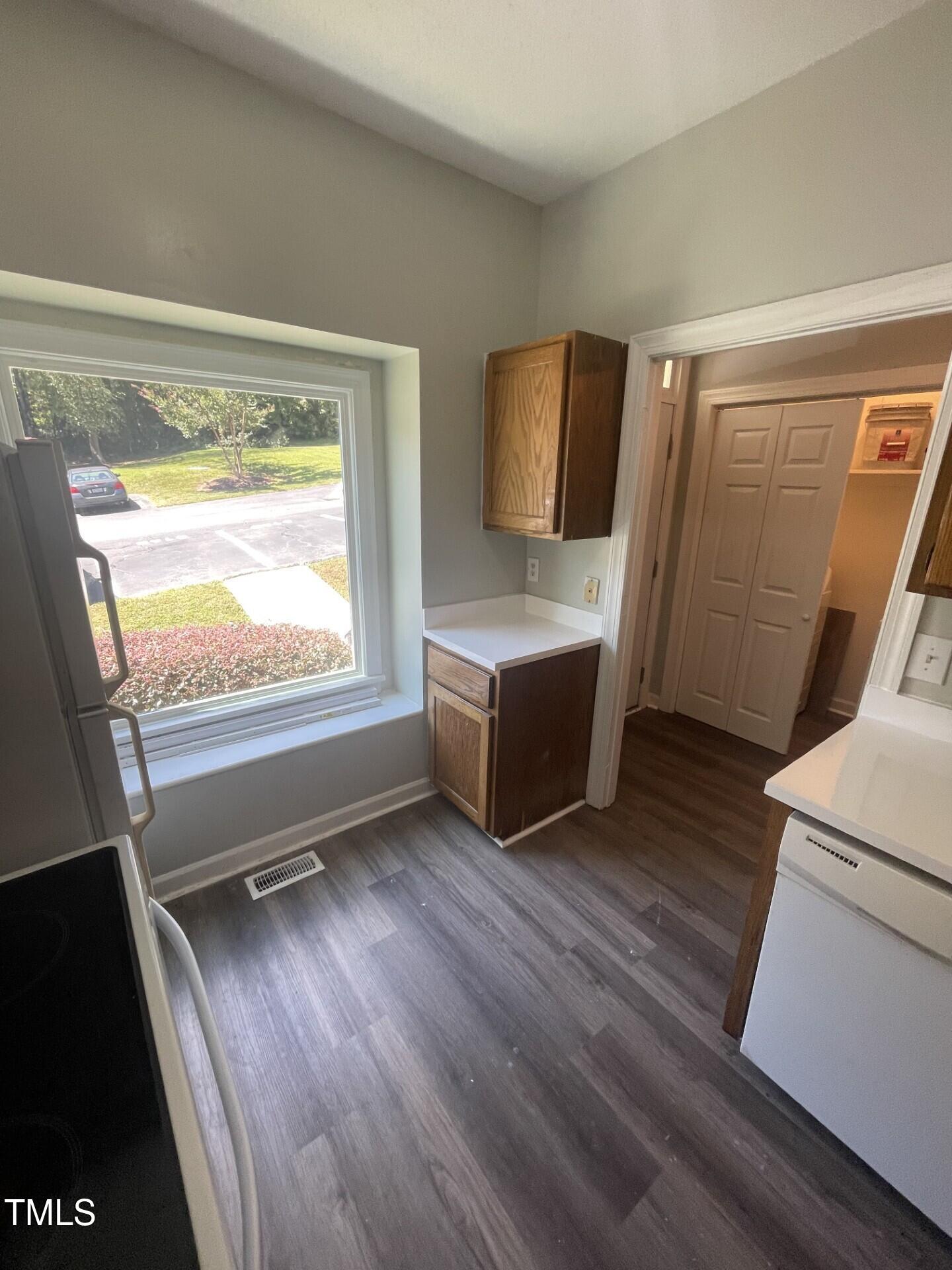 6140 Loch Laural Lane Raleigh, NC 27613 - Photo 9 of 21 a view of room with window and wooden floor