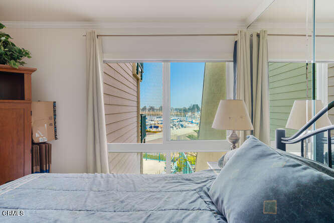2901 Peninsula Road, Unit 248 Oxnard, CA 93035 - Photo 12 of 26 a living room with furniture and a window