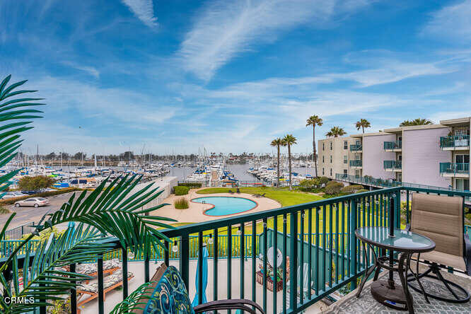 2901 Peninsula Road, Unit 248 Oxnard, CA 93035 - Photo 4 of 26 a view of a chairs and table in patio