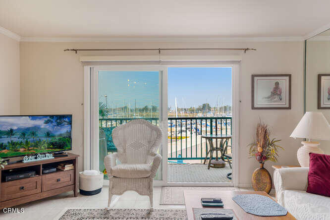 2901 Peninsula Road, Unit 248 Oxnard, CA 93035 - Photo 9 of 26 a living room with furniture and a window