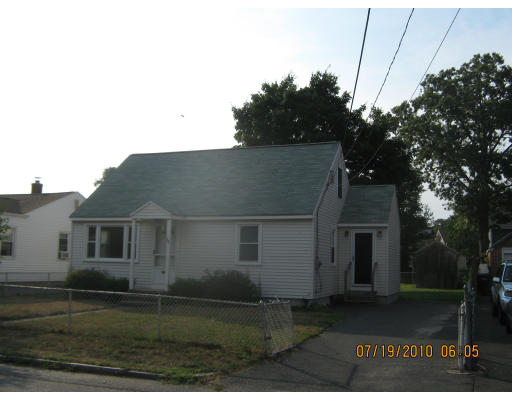 38 Victoria Street Springfield, MA 01104 - Photo 1 of 1 a front view of a house with a garden