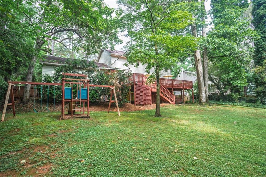 3838 Hunting Ridge Drive Southwest Lilburn, GA 30047 - Photo 55 of 56 a view of a park with slide