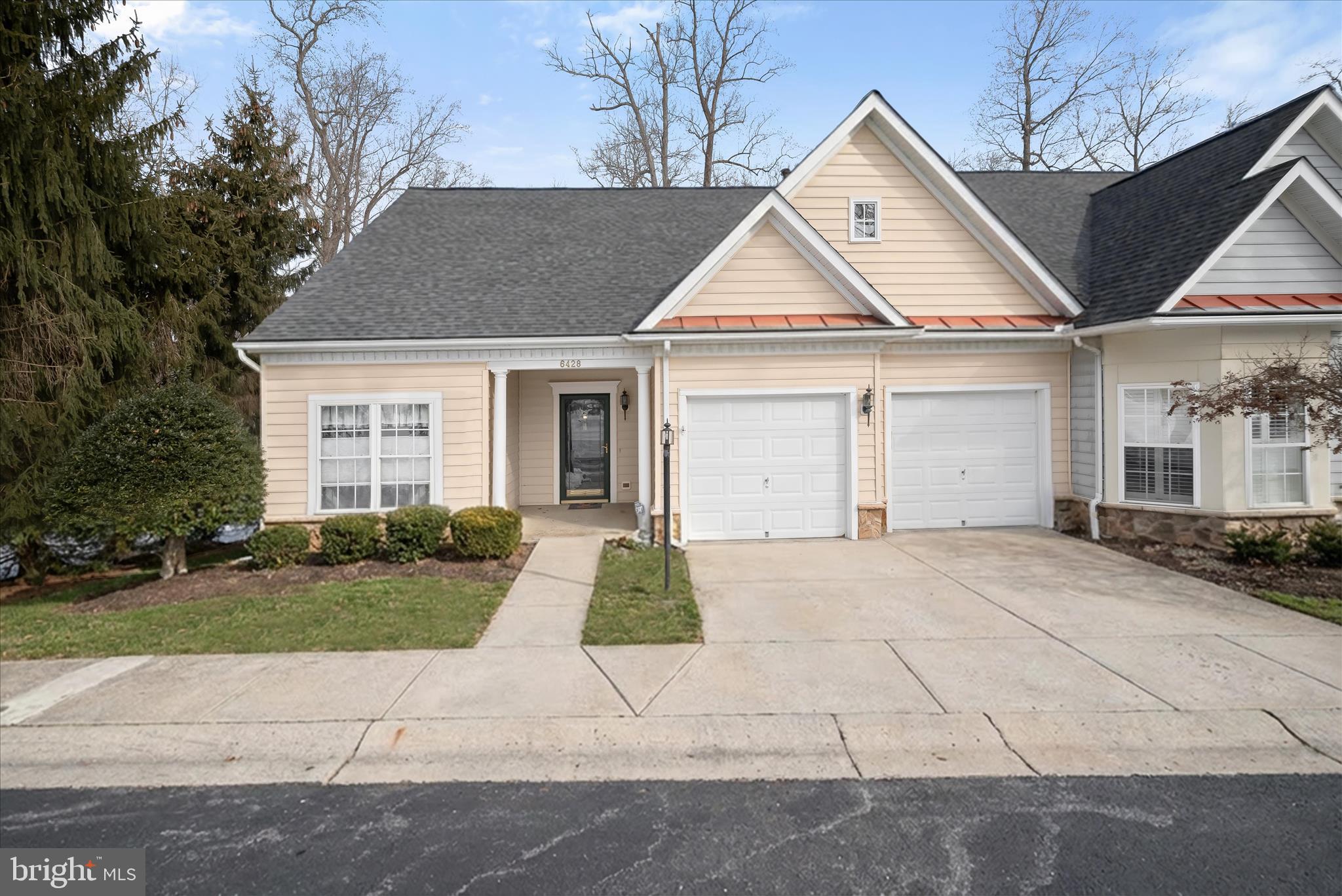 a view of house with yard