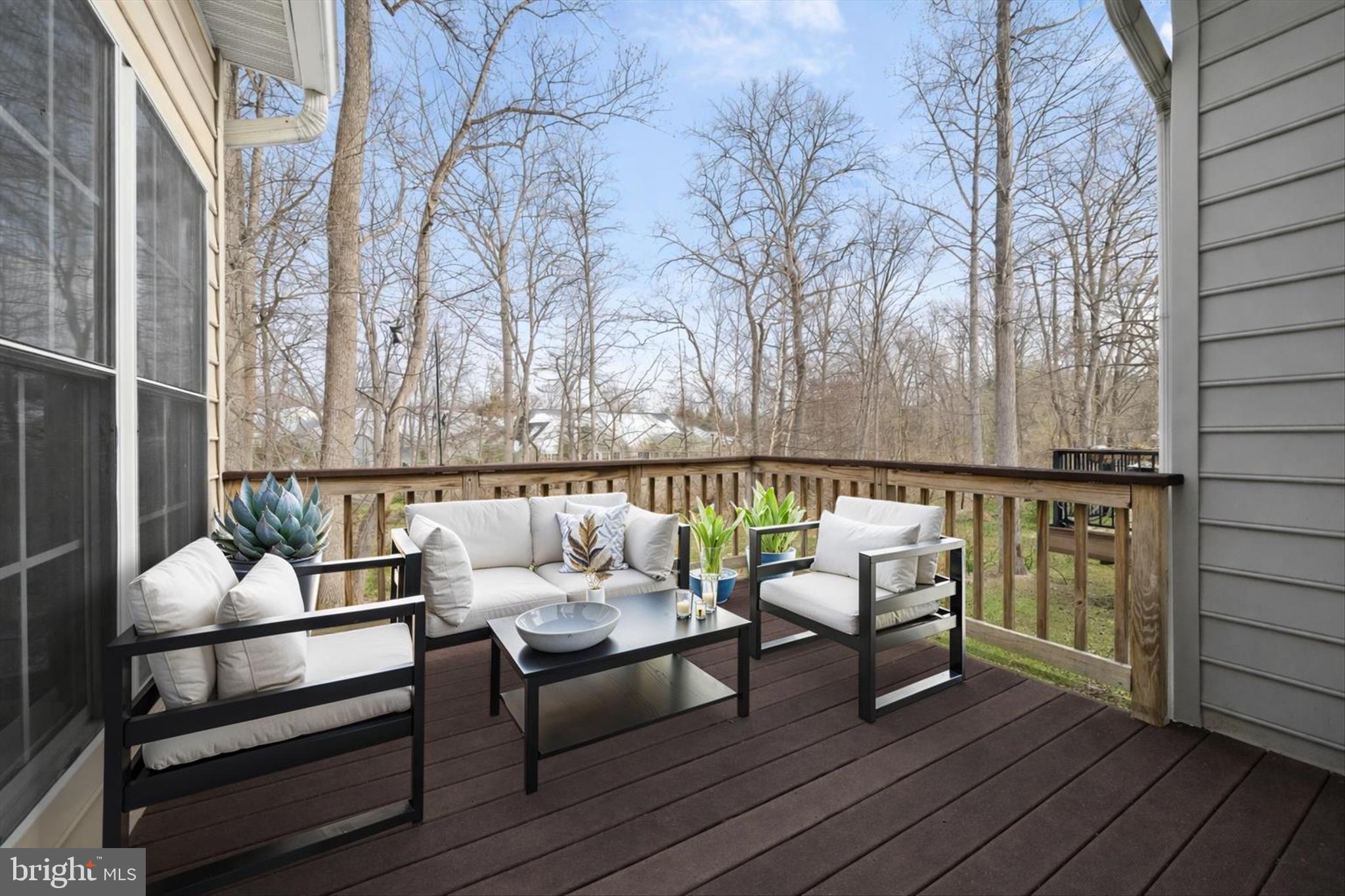 6428 Hickory Overlook, Unit 71 Columbia, MD 21044 - Photo 18 of 63 a roof deck with wooden floor and furniture
