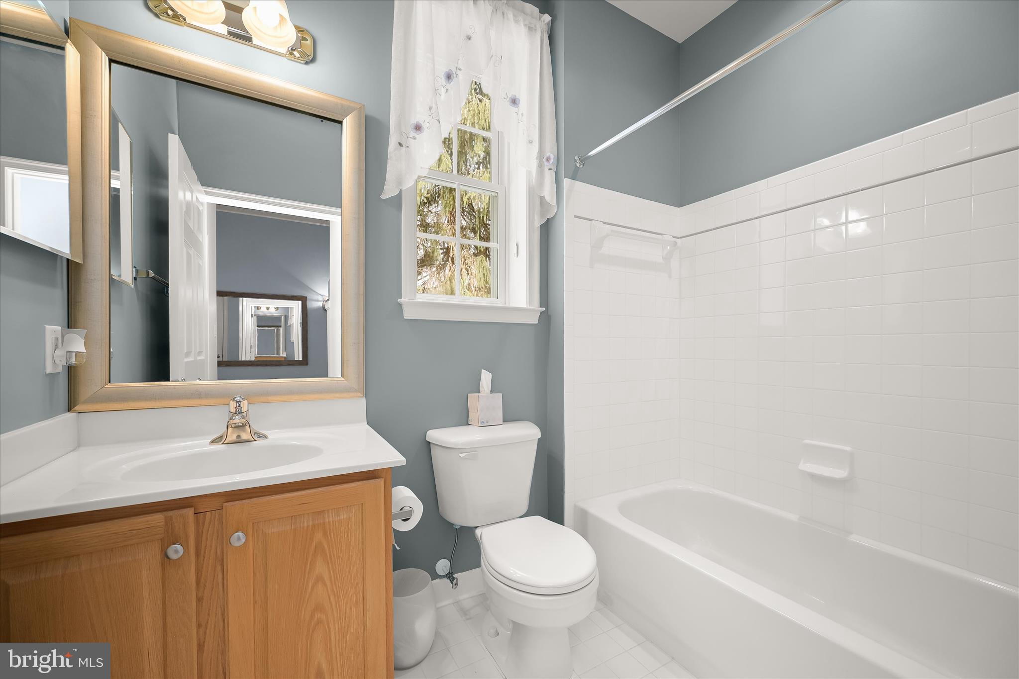 6428 Hickory Overlook, Unit 71 Columbia, MD 21044 - Photo 44 of 63 a bathroom with a sink toilet and shower
