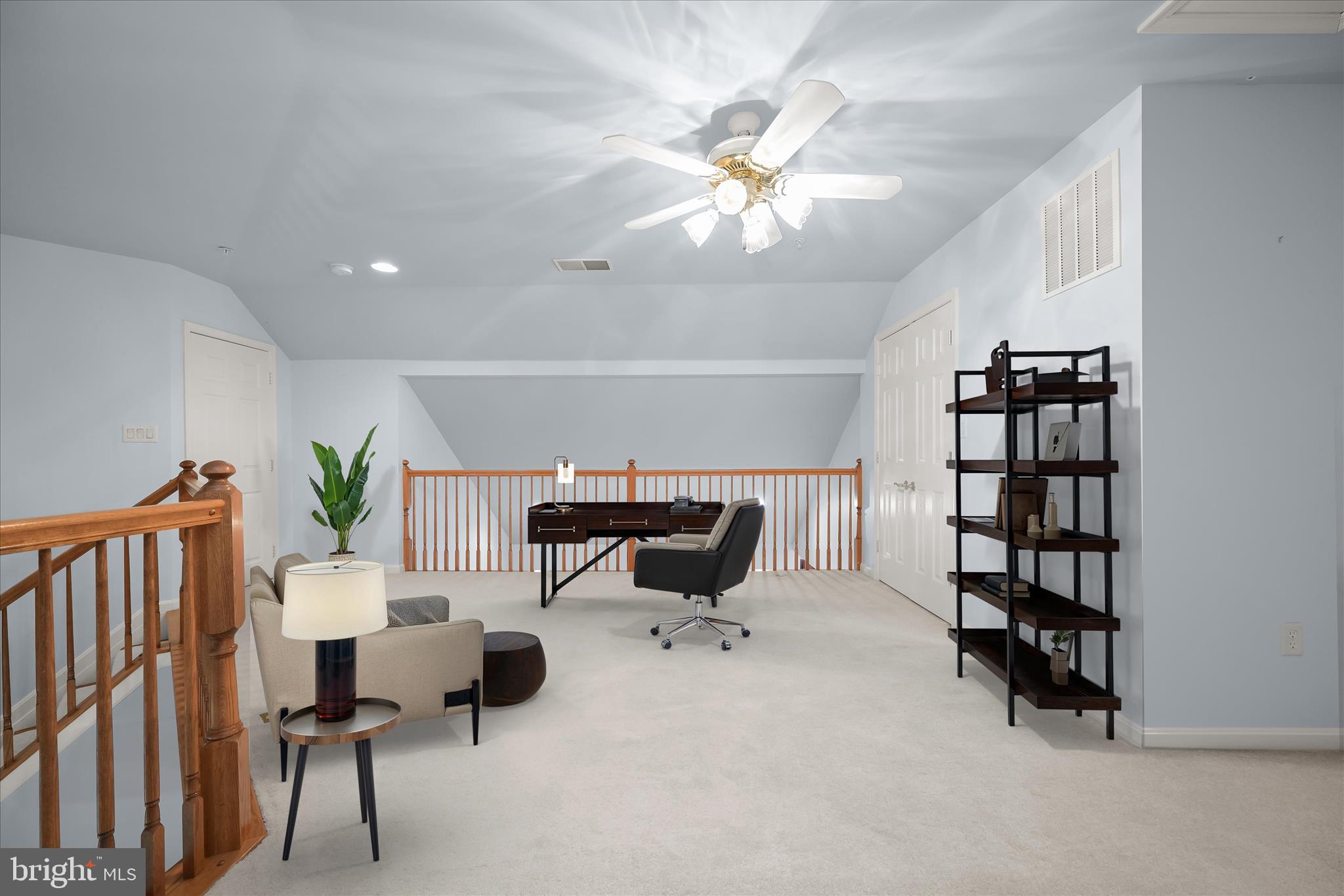 6428 Hickory Overlook, Unit 71 Columbia, MD 21044 - Photo 45 of 63 a living room with furniture and a chandelier