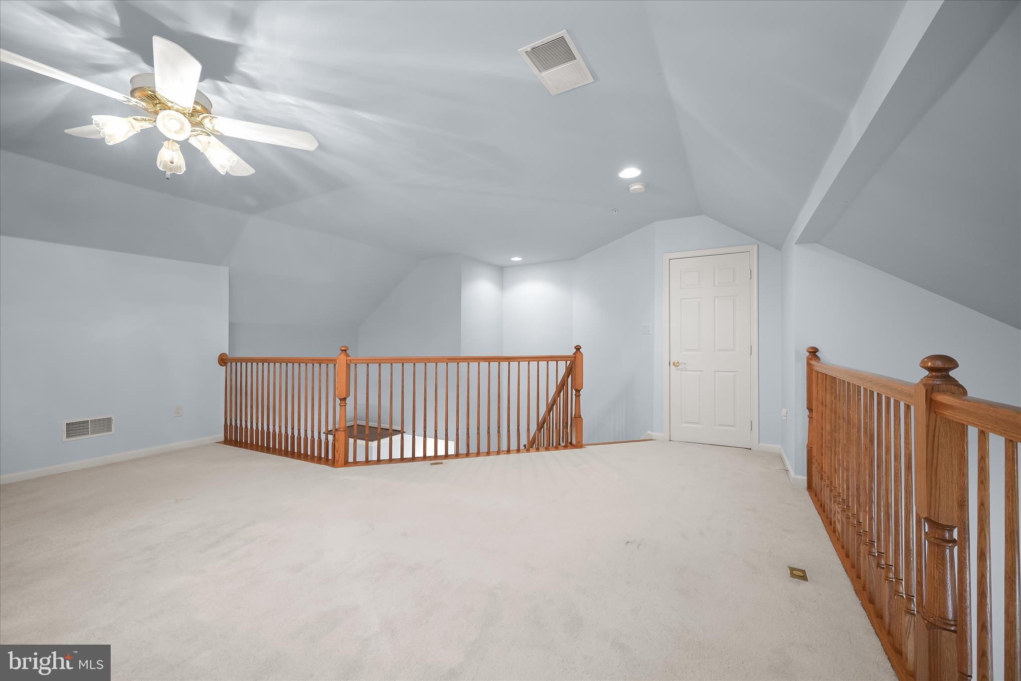 6428 Hickory Overlook, Unit 71 Columbia, MD 21044 - Photo 47 of 63 a view of a livingroom with a ceiling fan and window
