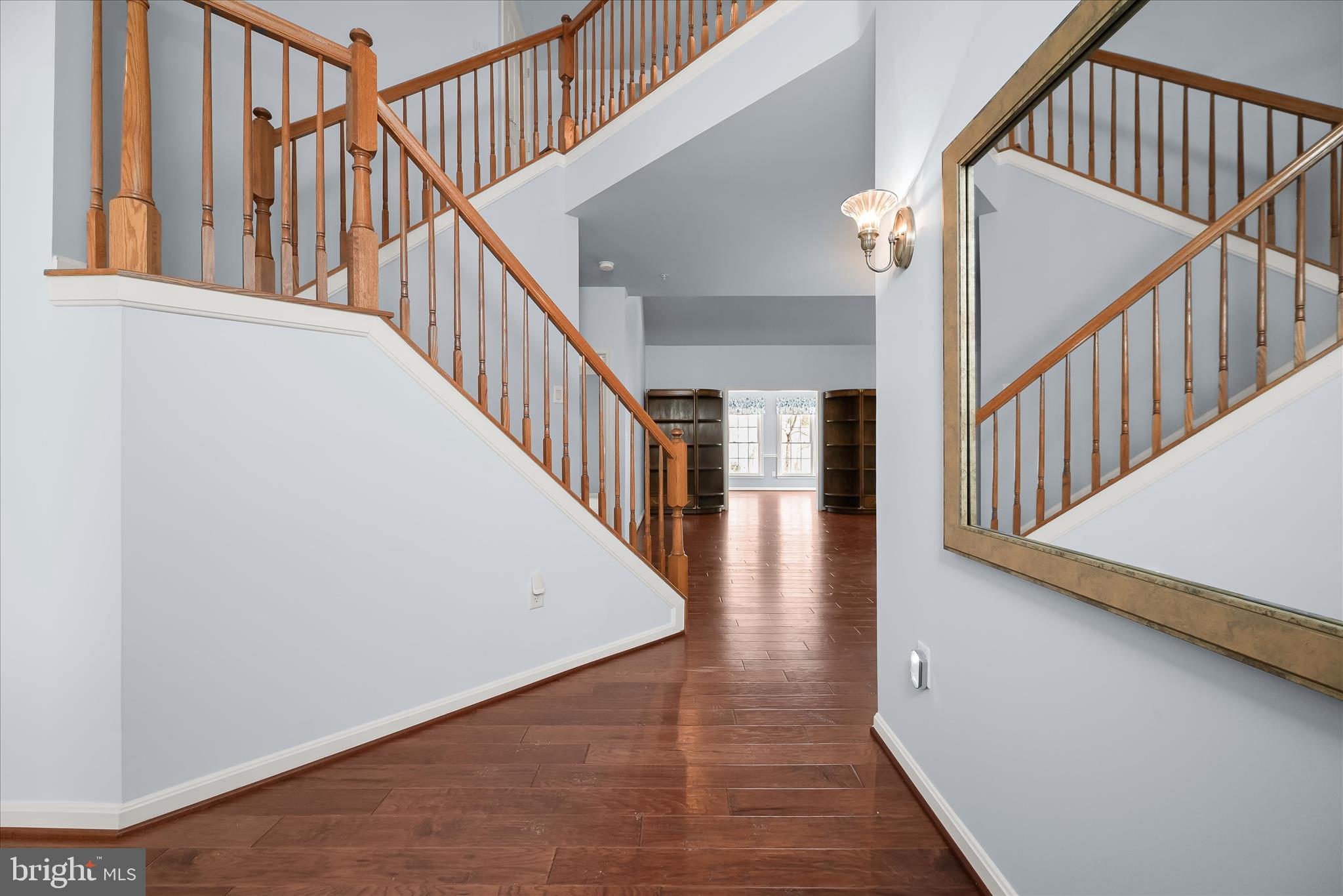 6428 Hickory Overlook, Unit 71 Columbia, MD 21044 - Photo 5 of 63 a view of staircase with wooden floor and white walls