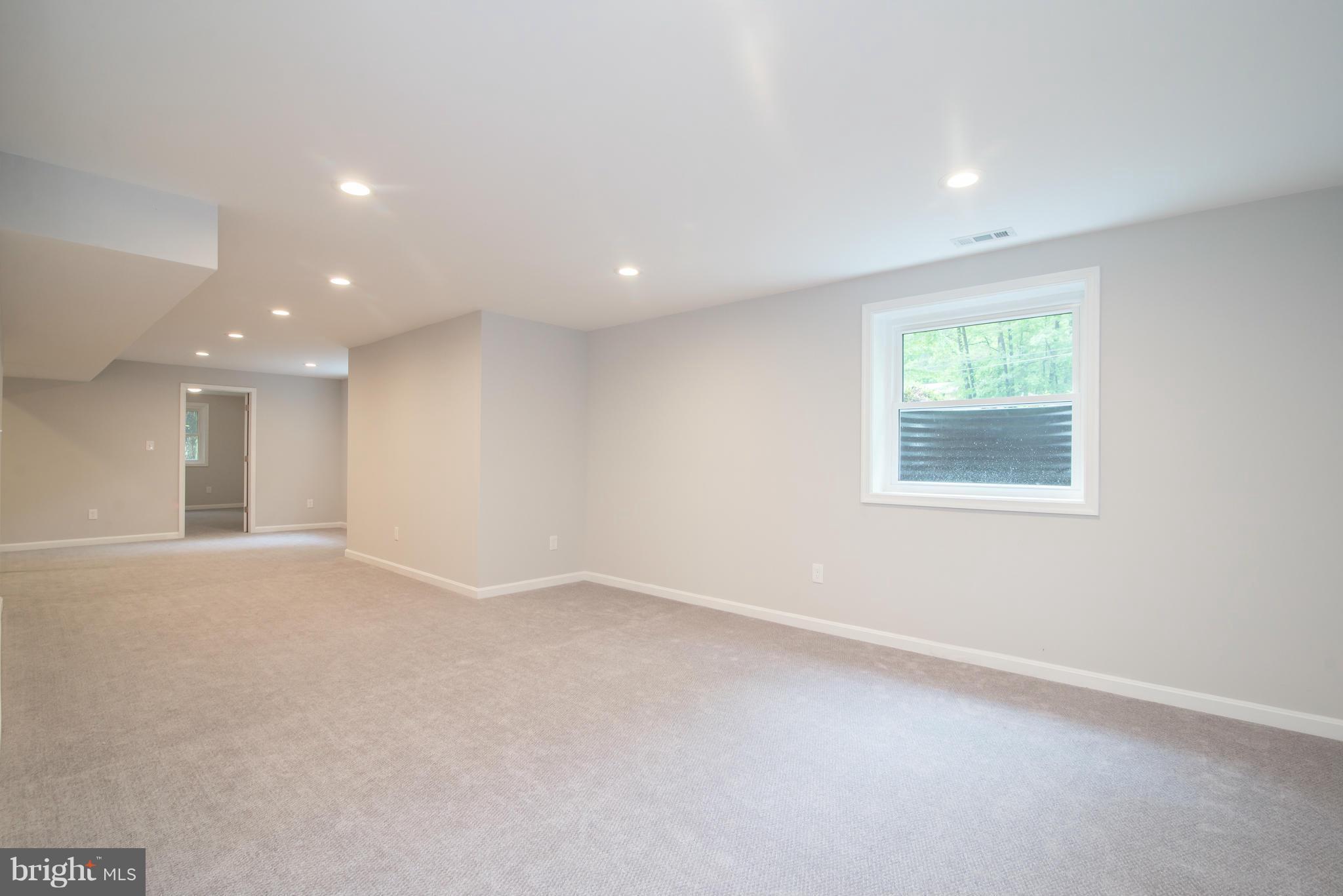 7132 Barry Road Alexandria, VA 22315 - Photo 22 of 28 an empty room with windows