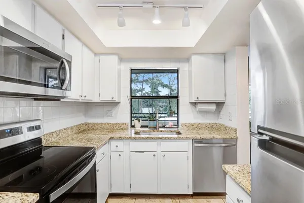 $150,000 | 13602 South Village Drive, Unit 1205, Tampa, FL 33618