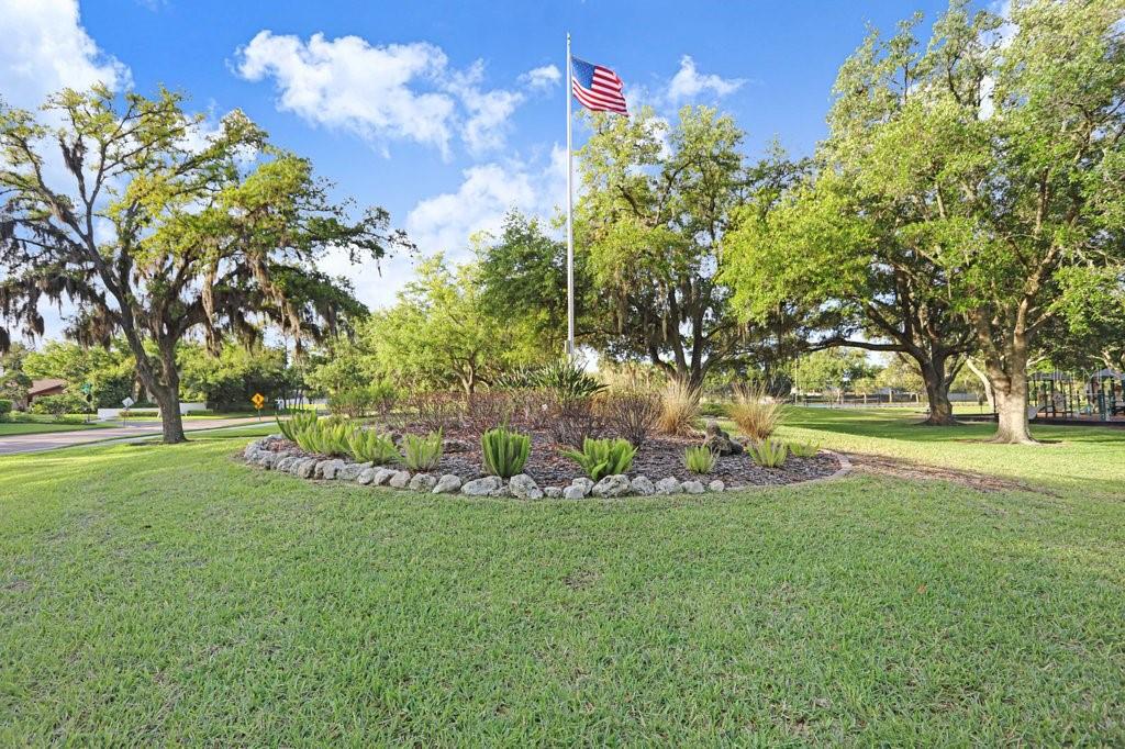 13602 South Village Drive, Unit 1205 Tampa, FL 33618 - Photo 48 of 51 a view of a park with large trees