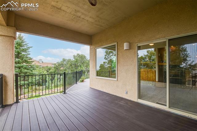 6240 Wilson Road Colorado Springs, CO 80919 - Photo 31 of 42 Covered area of the wrap around deck. Walk out of the living and dining area. This might become your favorite spot!