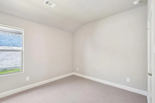 a walk in closet with a shower