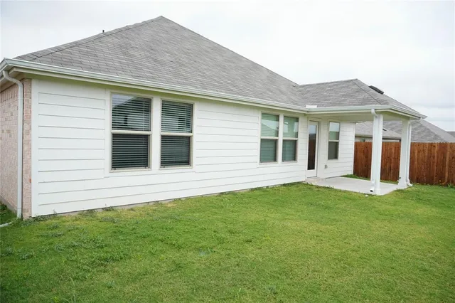 a house view with a garden space